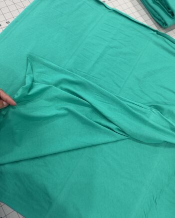 solid aqua cotton jersey knit fabric